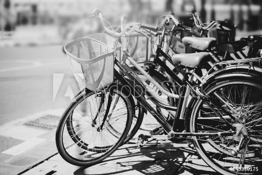 Image de Black and white travel bicycle for rent in urban vintage color effect
